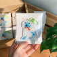 Naughty and Nice Pup Acrylic Keychain